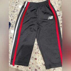 💥 New Balance💥Kids' Black Joggers with Red and White Stripes Like New SZ 12 M